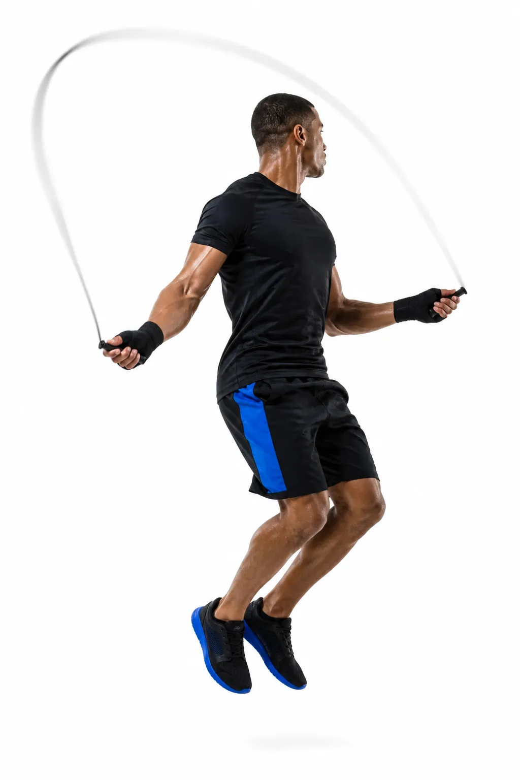 An athlete mid-jump over a skipping rope, the rope blurred into an arc